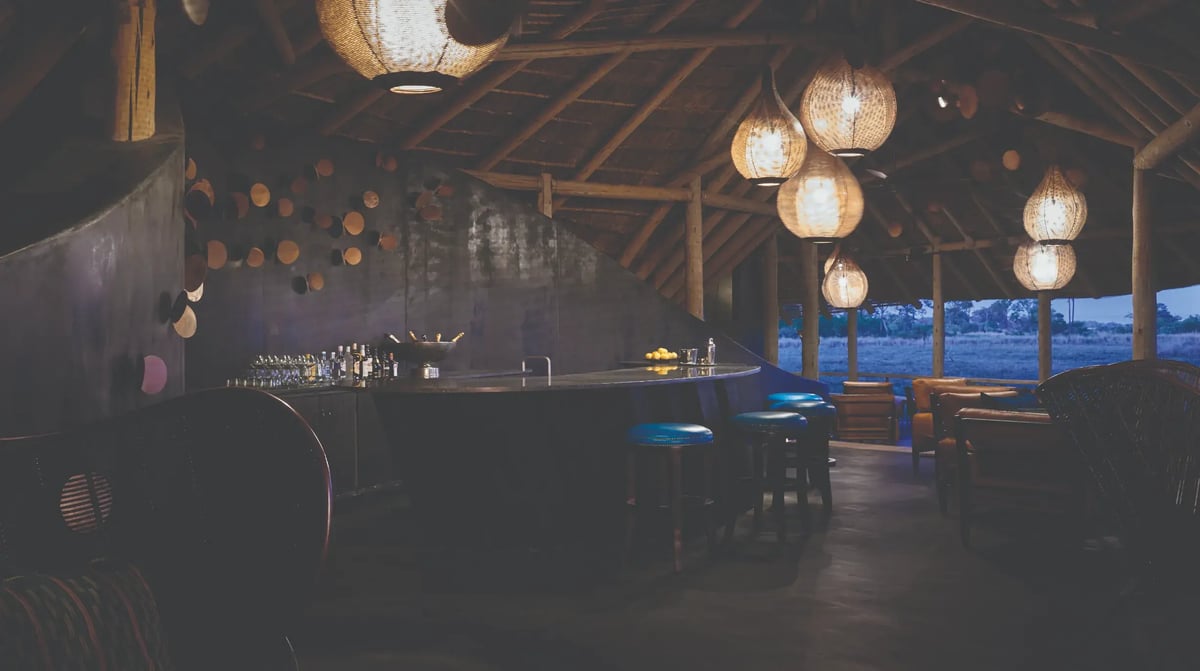 Belmond Eagle Island Lodge bar by night