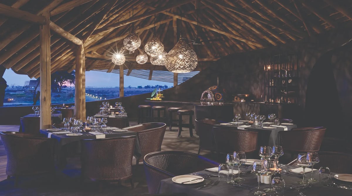 Belmond Eagle Island Lodge restaurant by night